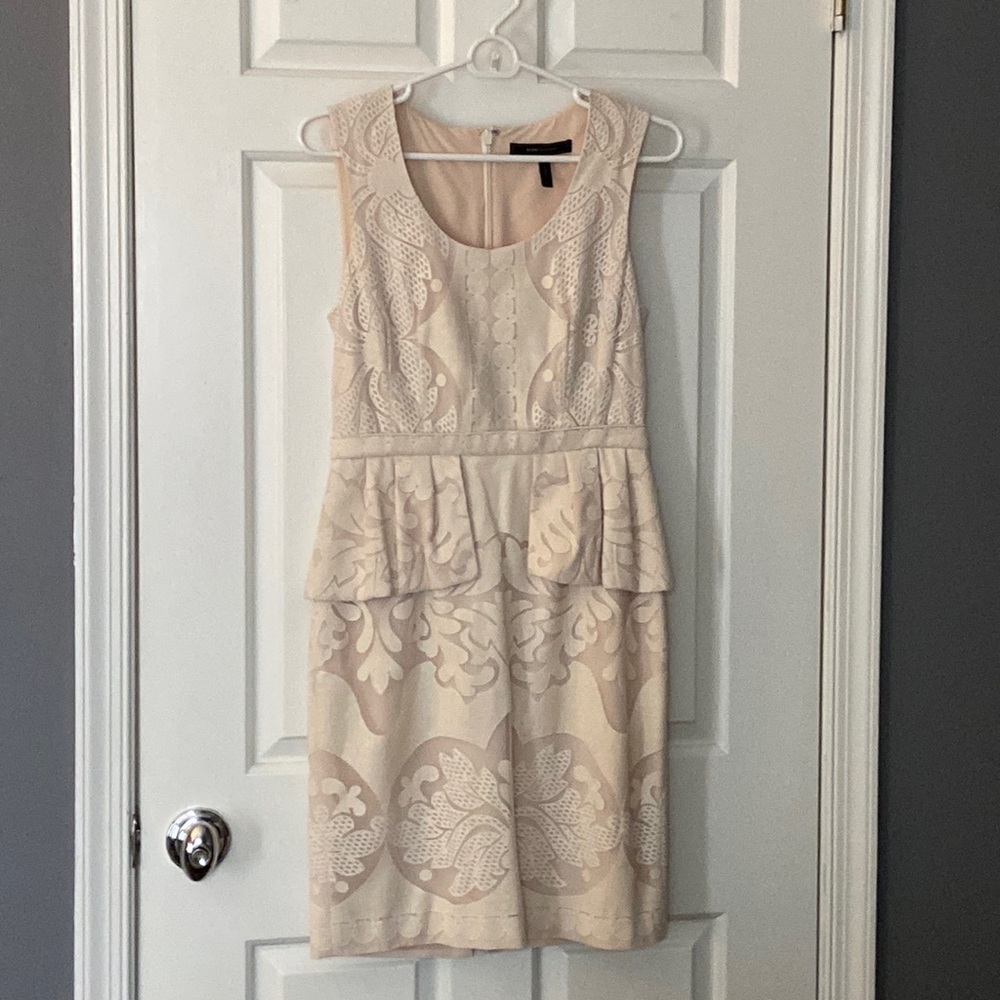 BCBG Max Azria cream lace peplum waist sleeveless dress. Never worn